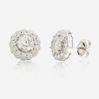 A pair of diamond and white gold earrings