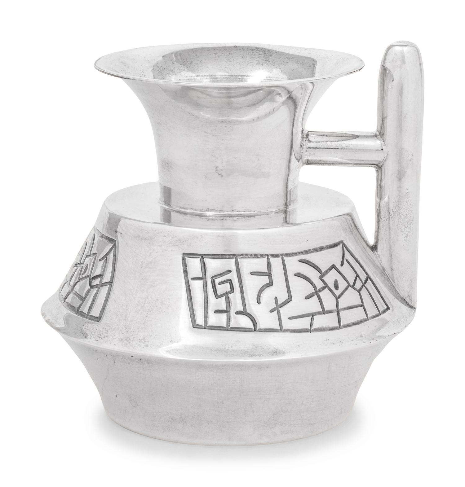 A Mexican Silver Pitcher