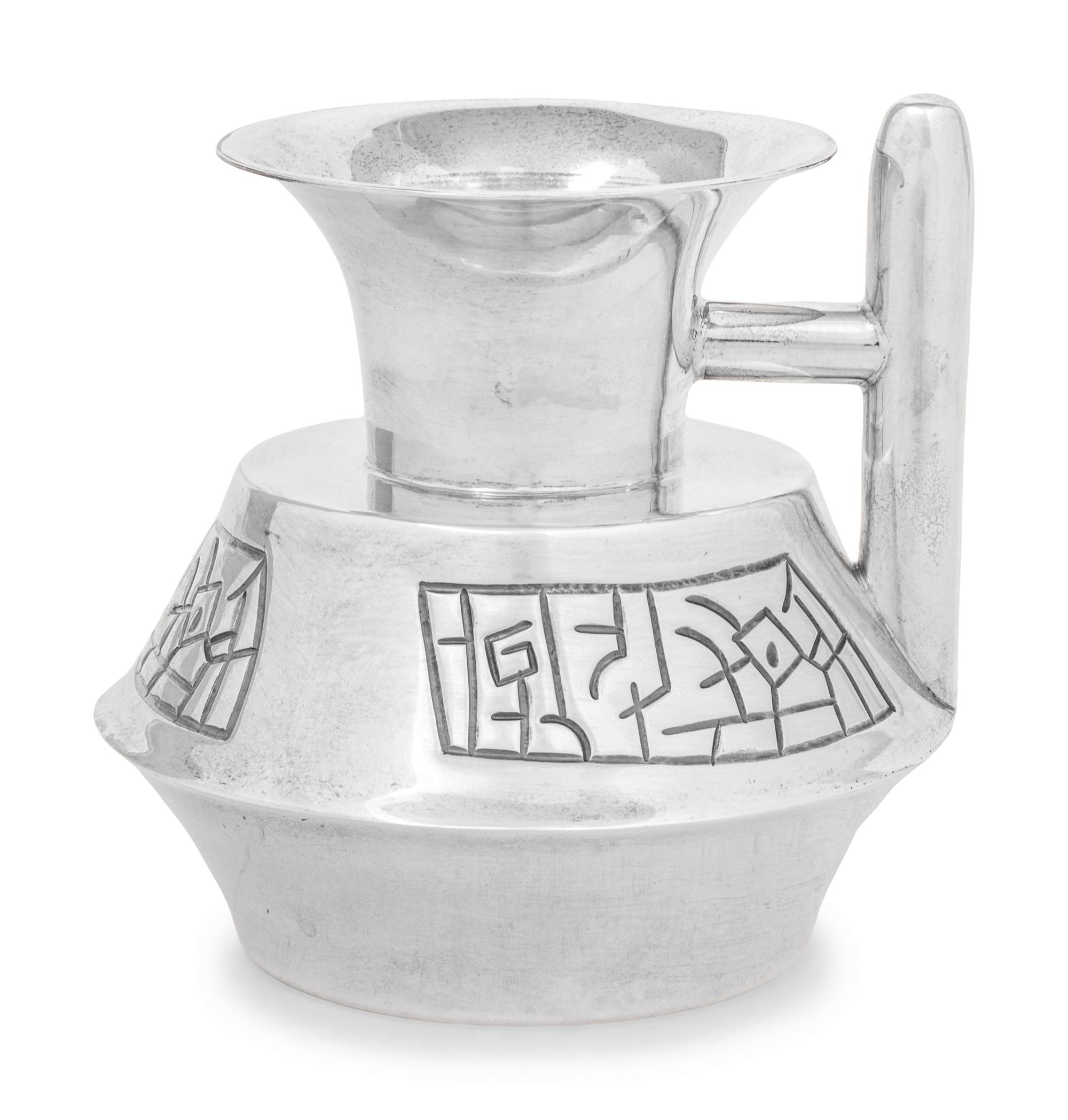 A Mexican Silver Pitcher