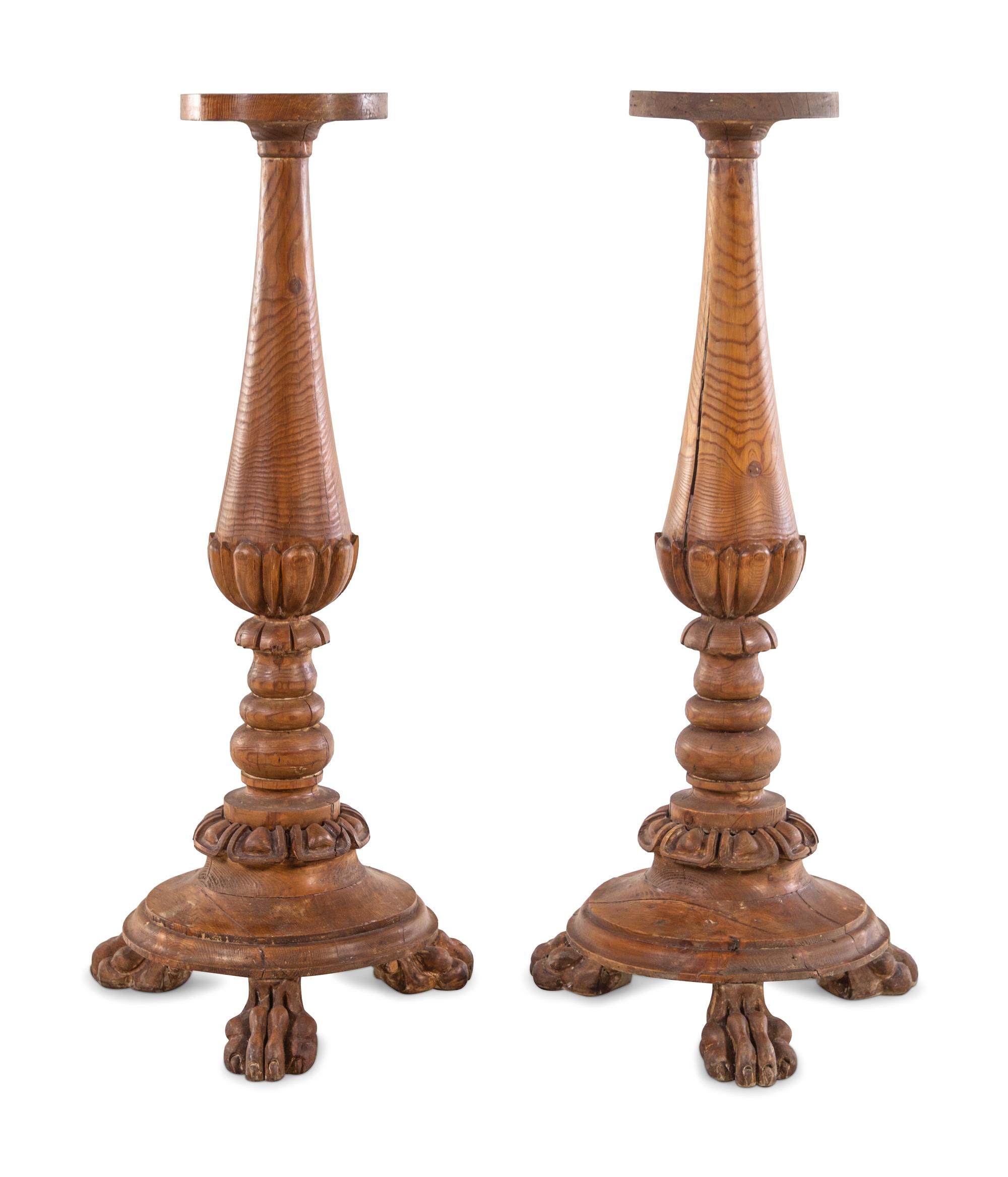 A Pair of Continental Carved Pedestals