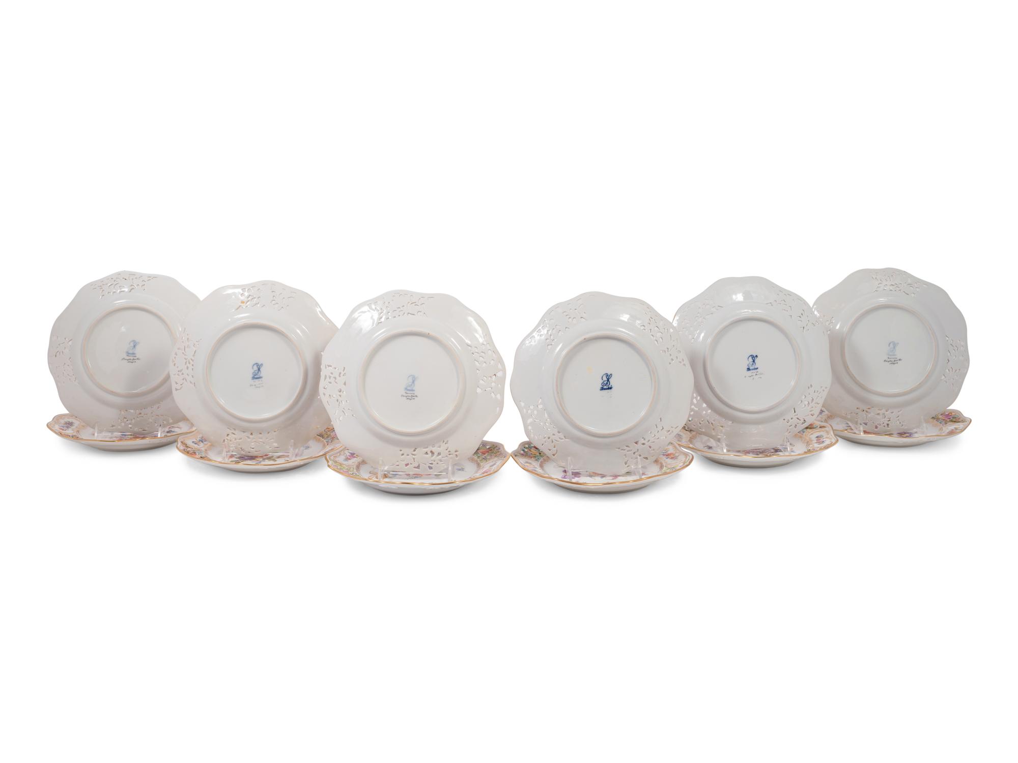 A Set of Twelve Dresden Hand-Painted Porcelain Plates