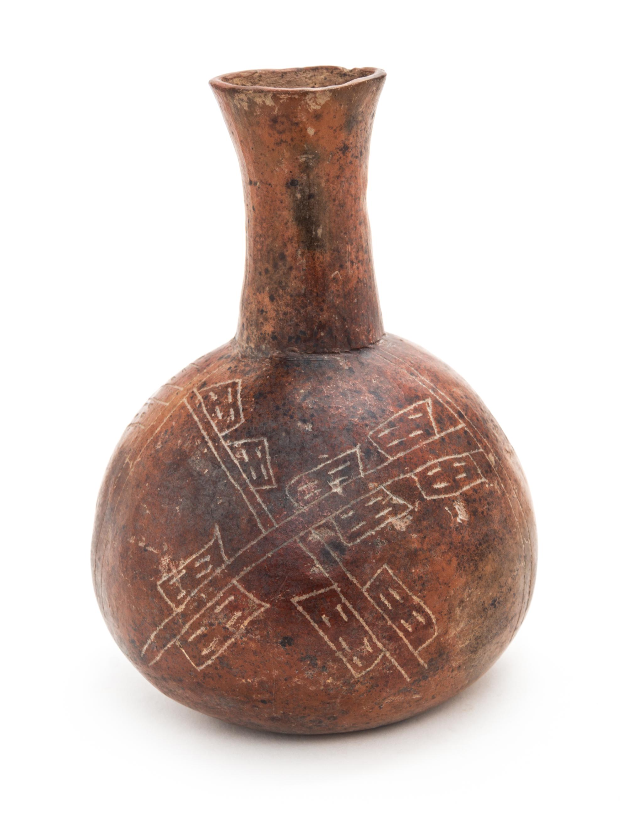 A Mexican Polished Earthenware Vessel. Height 6 1/2 x width 4 3/4 x depth 4 3/4 inches.