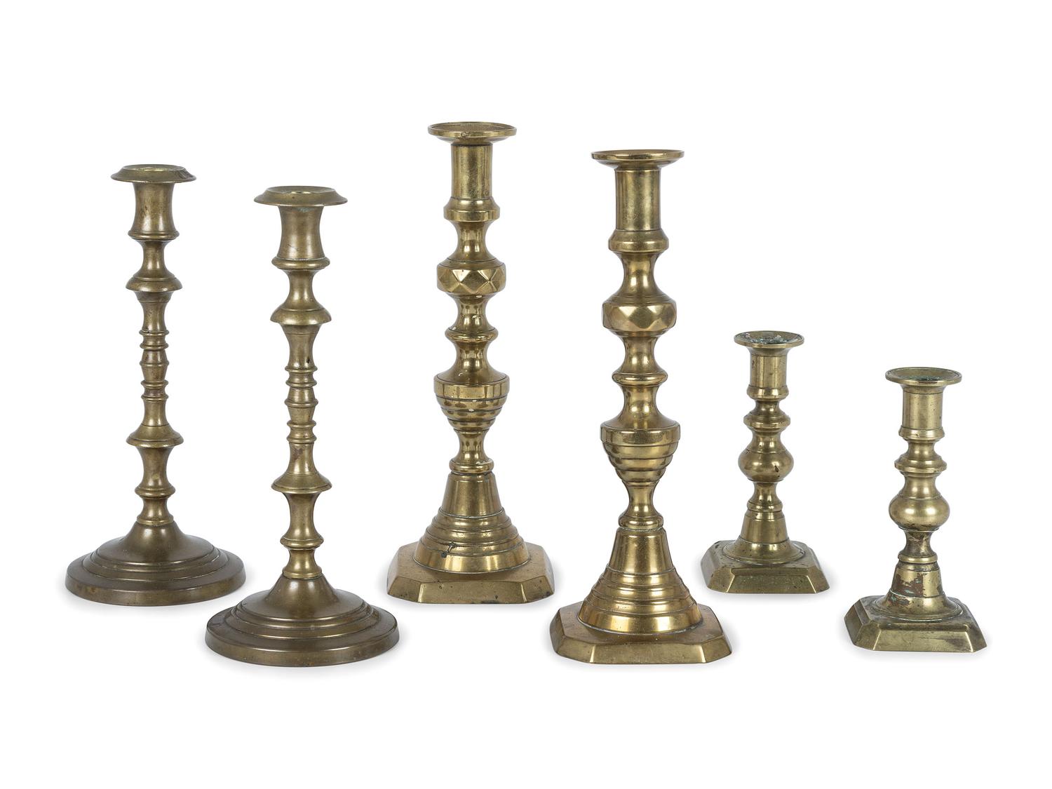 Three Pairs of English Brass Candlesticks