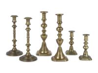 Three Pairs of English Brass Candlesticks