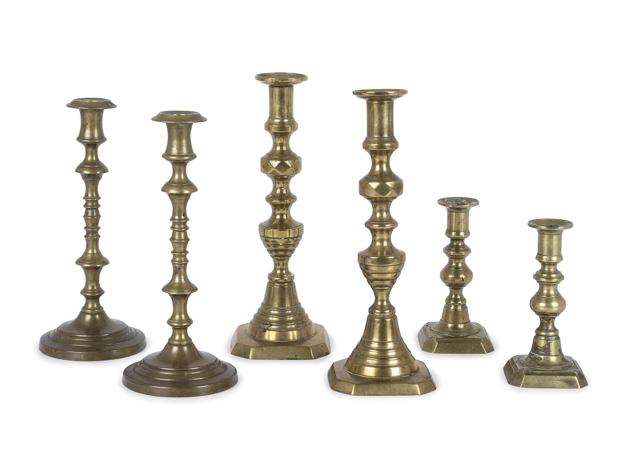 Three Pairs of English Brass Candlesticks