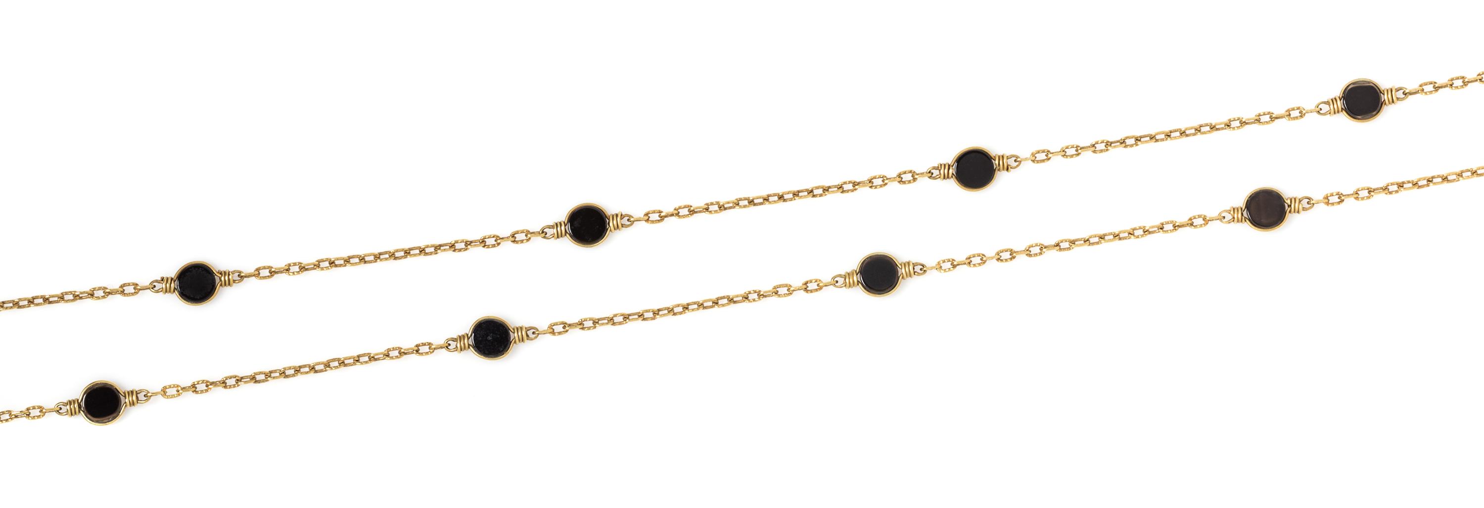 A Yellow Gold and Onyx Longchain, 8.00 dwts.