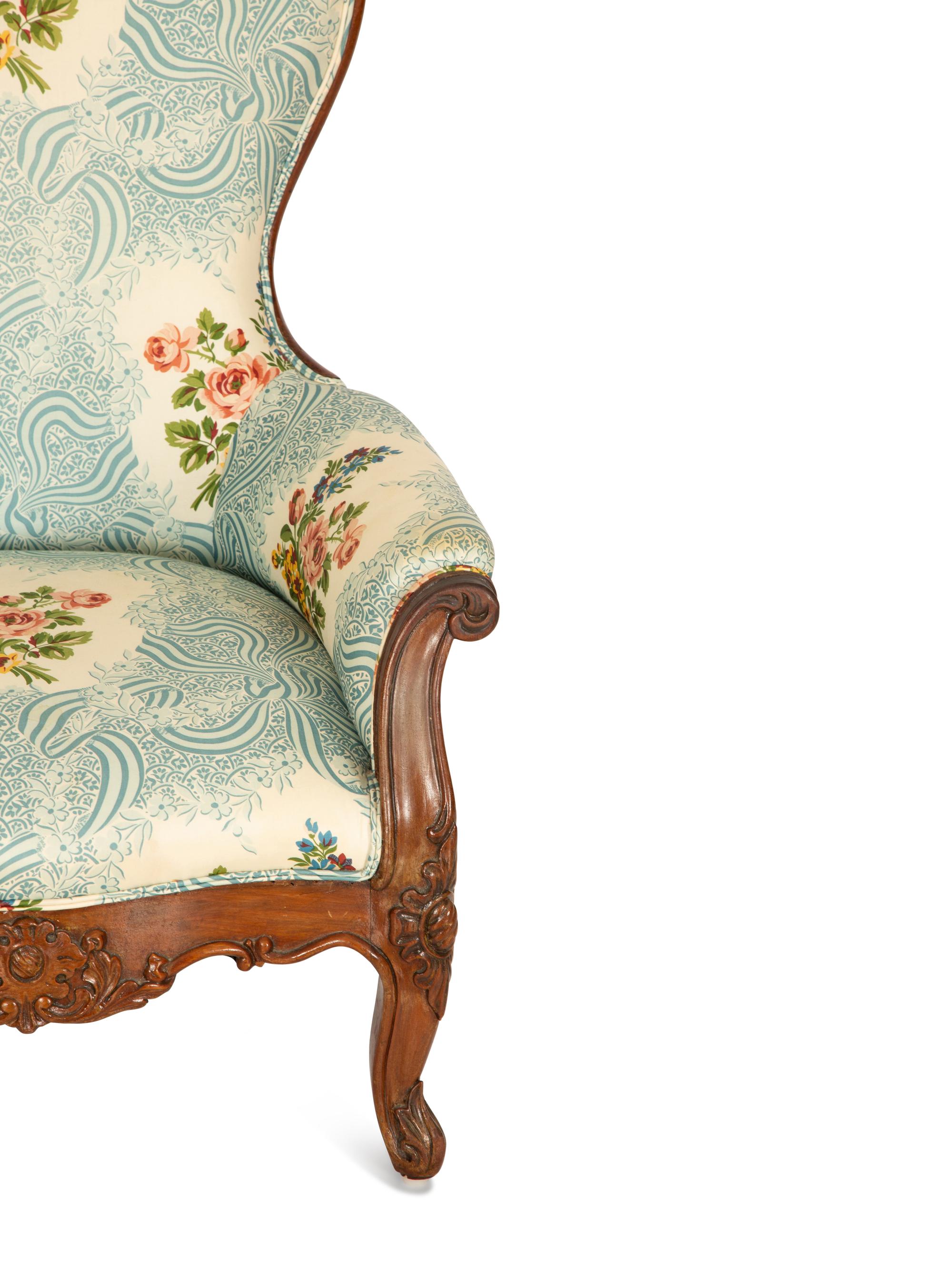A Victorian Carved Mahogany Slipper Chair