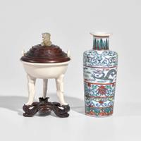 A Chinese Dehua porcelain small tripod censer and a small doucai vase 德化窑三足香炉及斗彩小花尊一件 17th/18th century and later ??????? ???