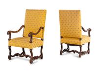 A Pair of Louis XIV Walnut Armchairs