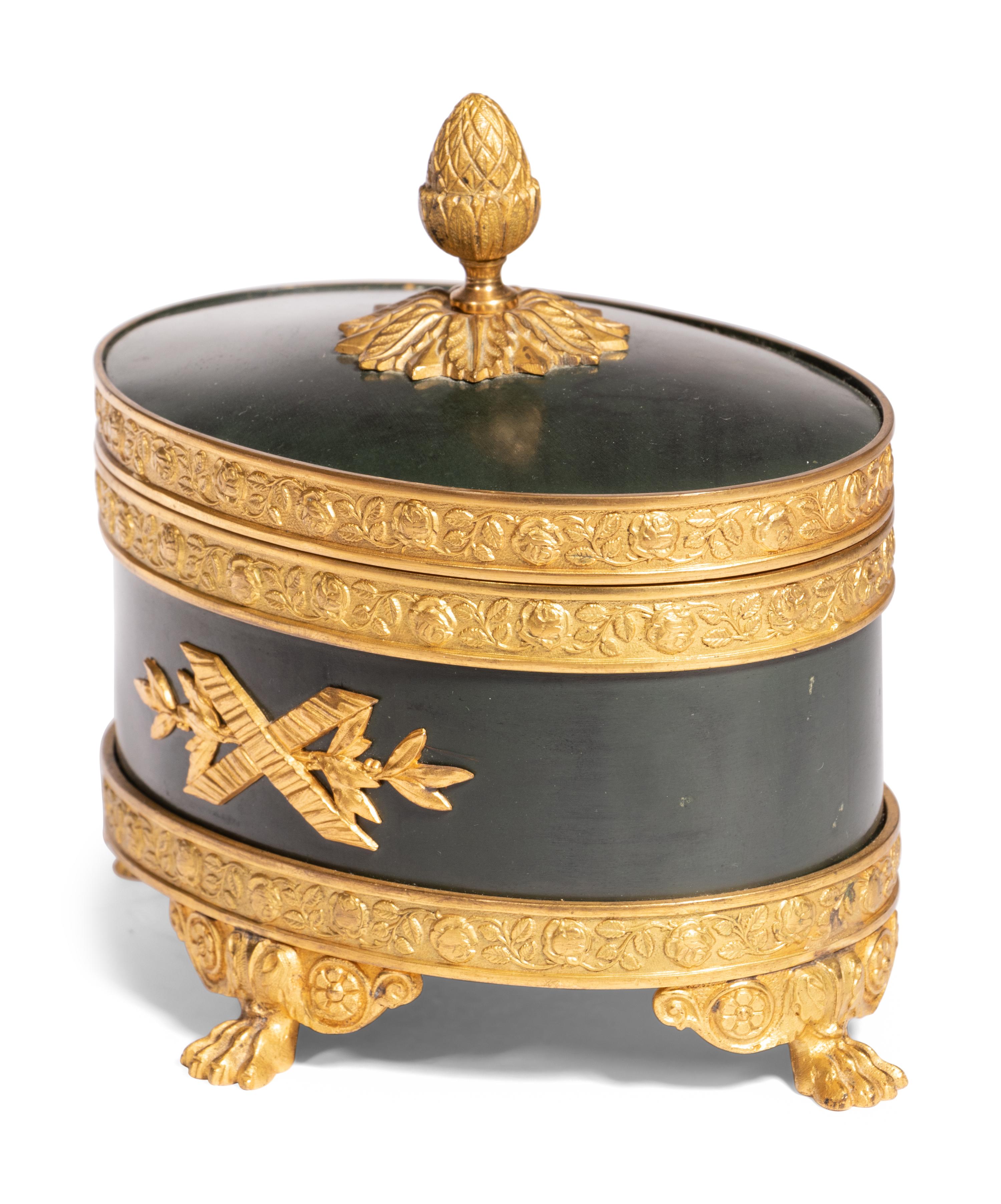 An English Silver Box, an Italian Gilt Metal Box and a Patinated Metal Table Casket