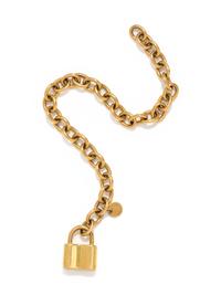 TIFFANY & CO., YELLOW GOLD '1837 PADLOCK CHARM' BRACELET