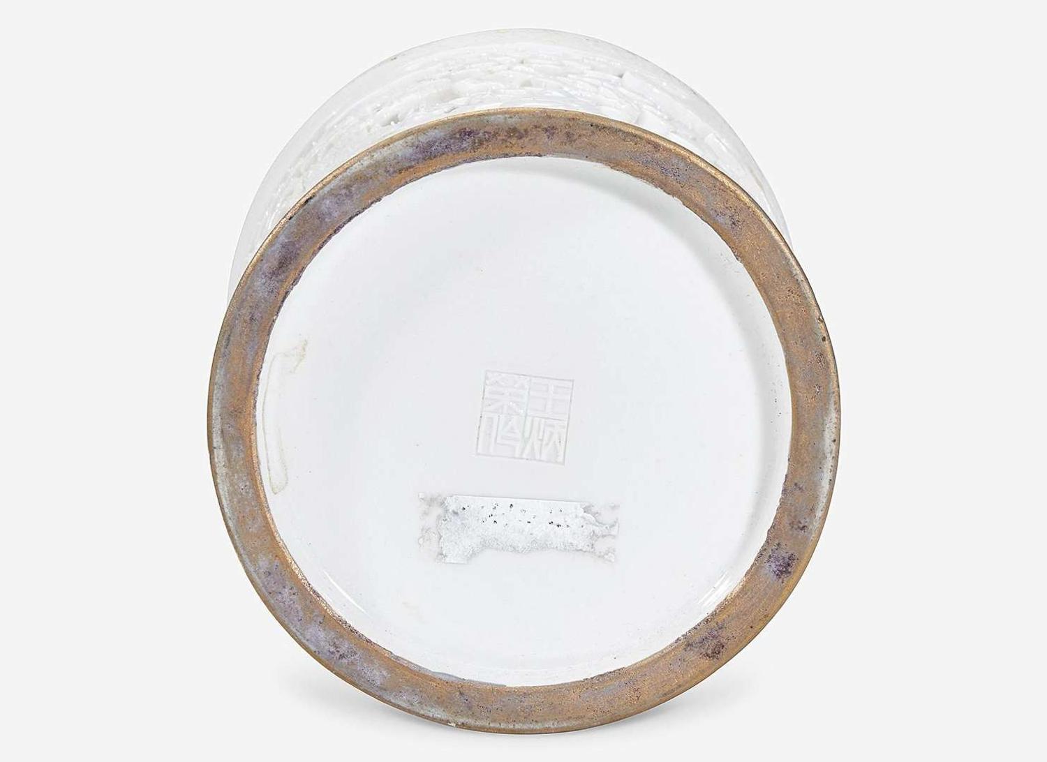 A Chinese molded and carved porcelain 'Pine' brushwasher and a "Workmen in a Landscape" brush pot, bearing mark of Wang Bingrong 瓷塑筆筒及筆洗 王炳榮款