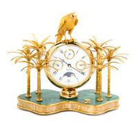 A Swiss Gilt Metal and Stone Inset Desk Clock, Mouawad Height 9 3/4 inches. — MODERN