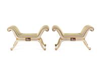A Pair of Russian Parcel Gilt and White-Painted Window Seats