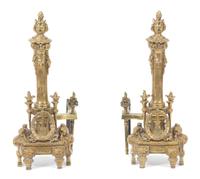 A Pair of Louis XVI Style Gilt Bronze Chenets Height 19 3/4 inches. — 19TH CENTURY