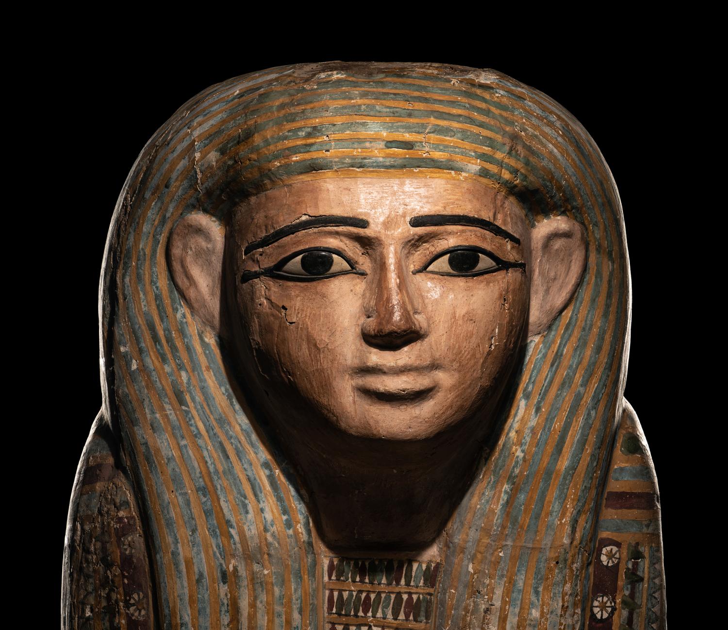 An Egyptian Polychrome Wood Mummy Mask