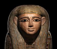 An Egyptian Polychrome Wood Mummy Mask