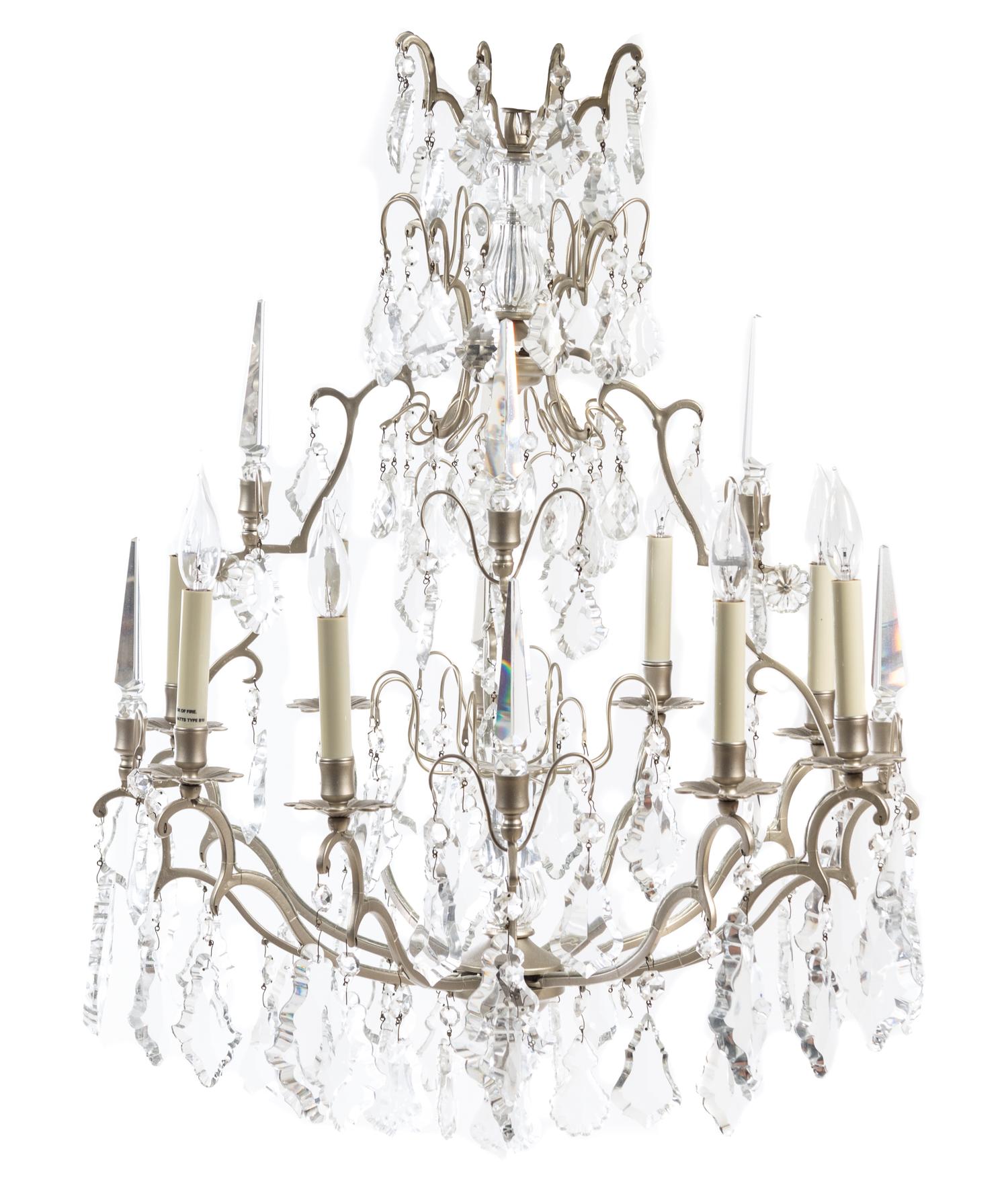 A Silvered Metal Eight-Light Chandelier Diameter 25 1/2 inches. — 20TH CENTURY