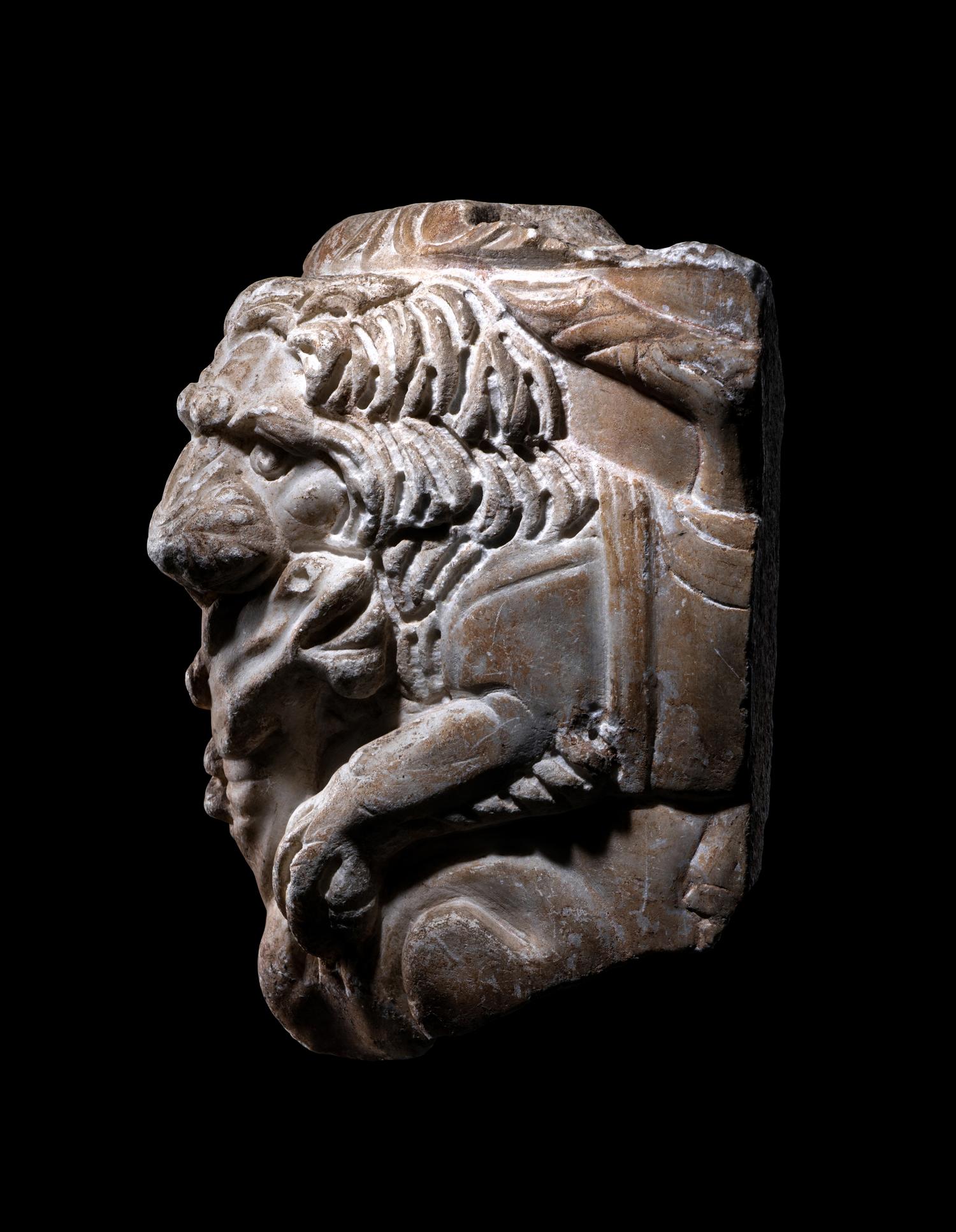 A Roman Marble Sarcophagus Fragment with a Lion