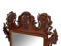 A George III Style Carved and Parcel Gilt Mahogany Mirror