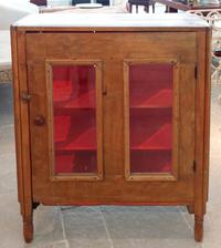 A Pine Single-Door Glazed Cabinet Height 40 1/4 x width 34 1/4 inches.