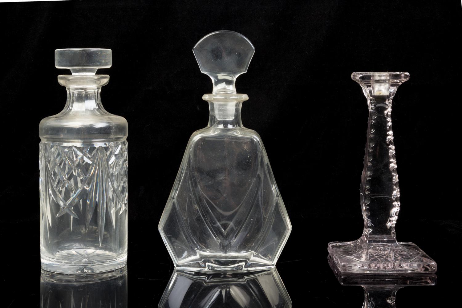 Five Molded or Cut Glass Decanters Height of tallest 13 inches.