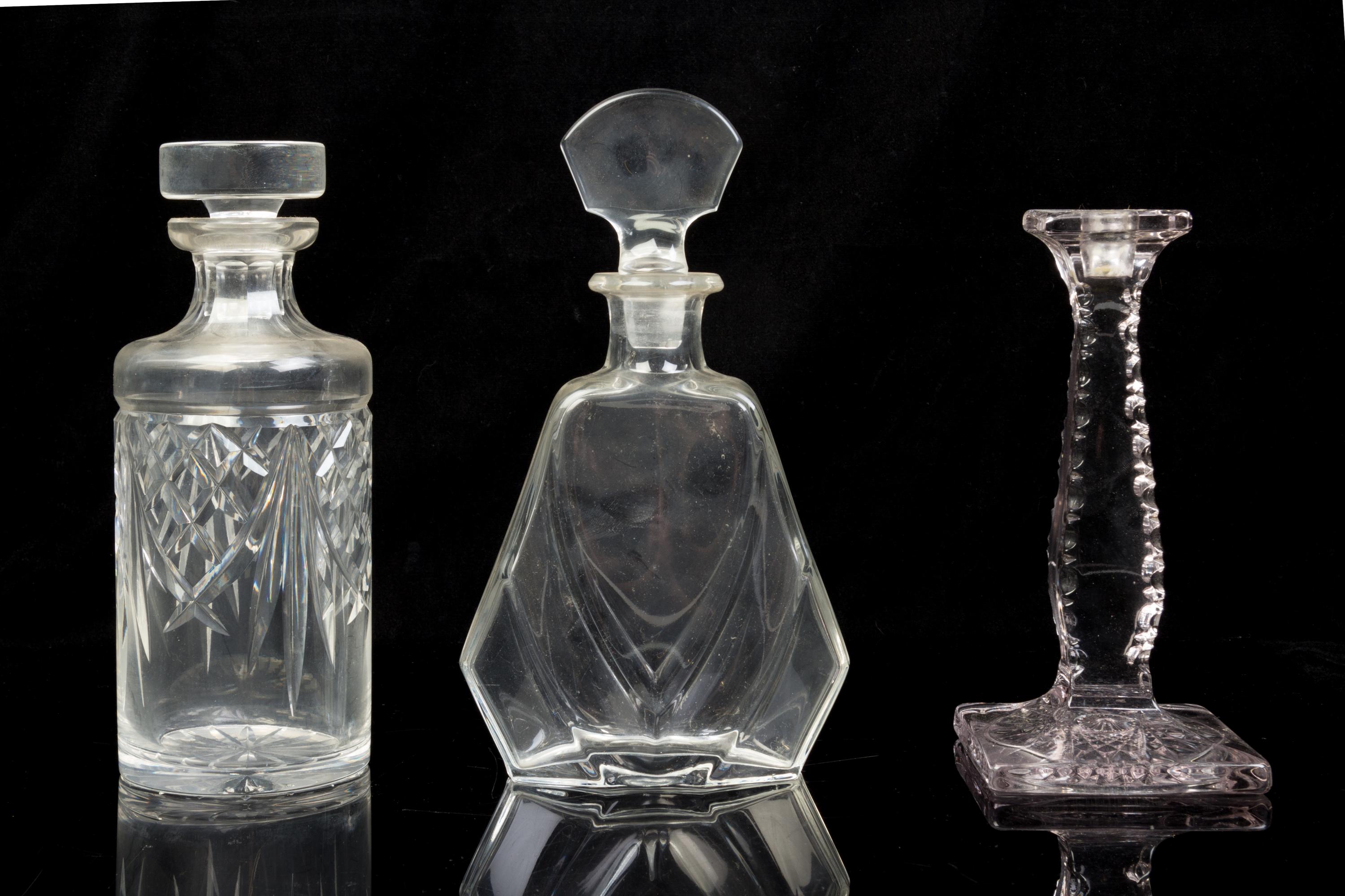 Five Molded or Cut Glass Decanters Height of tallest 13 inches.