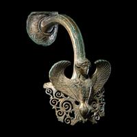 A Greek Bronze Hydria Handle with a Siren