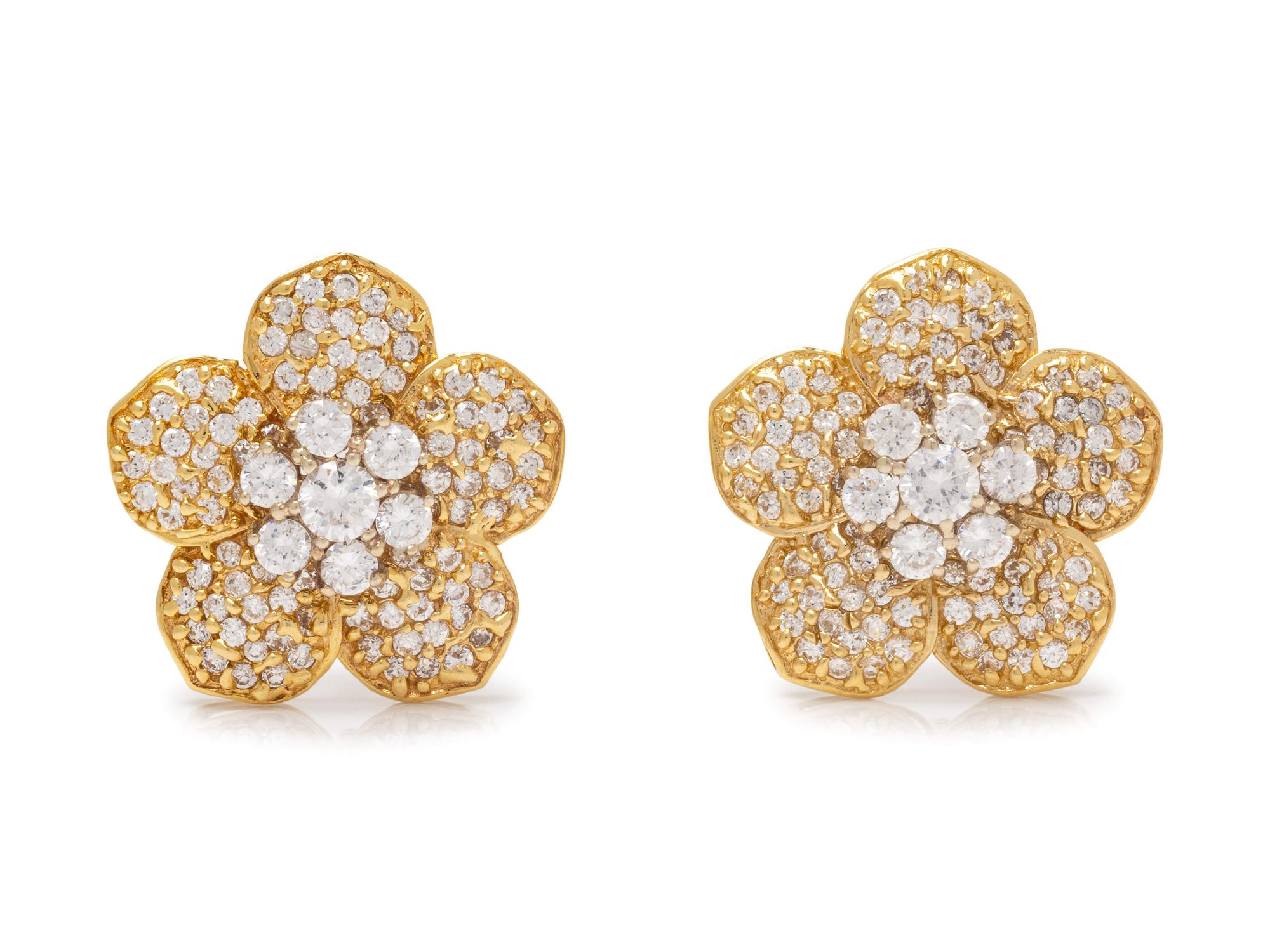 A Pair of 14 Karat Yellow Gold and Diamond Simulant Earclips,