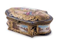 A Sèvres Style Painted and Parcel Gilt Porcelain Table Casket