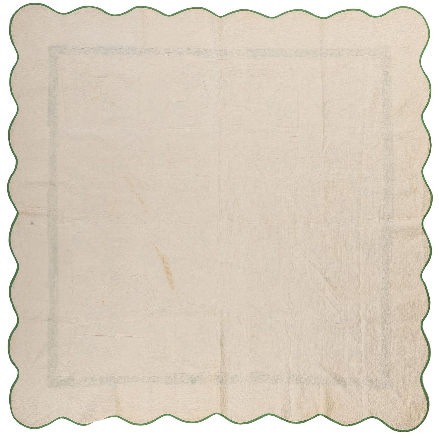 A Basket of Flowers Pattern Quilt with a Scalloped Edge