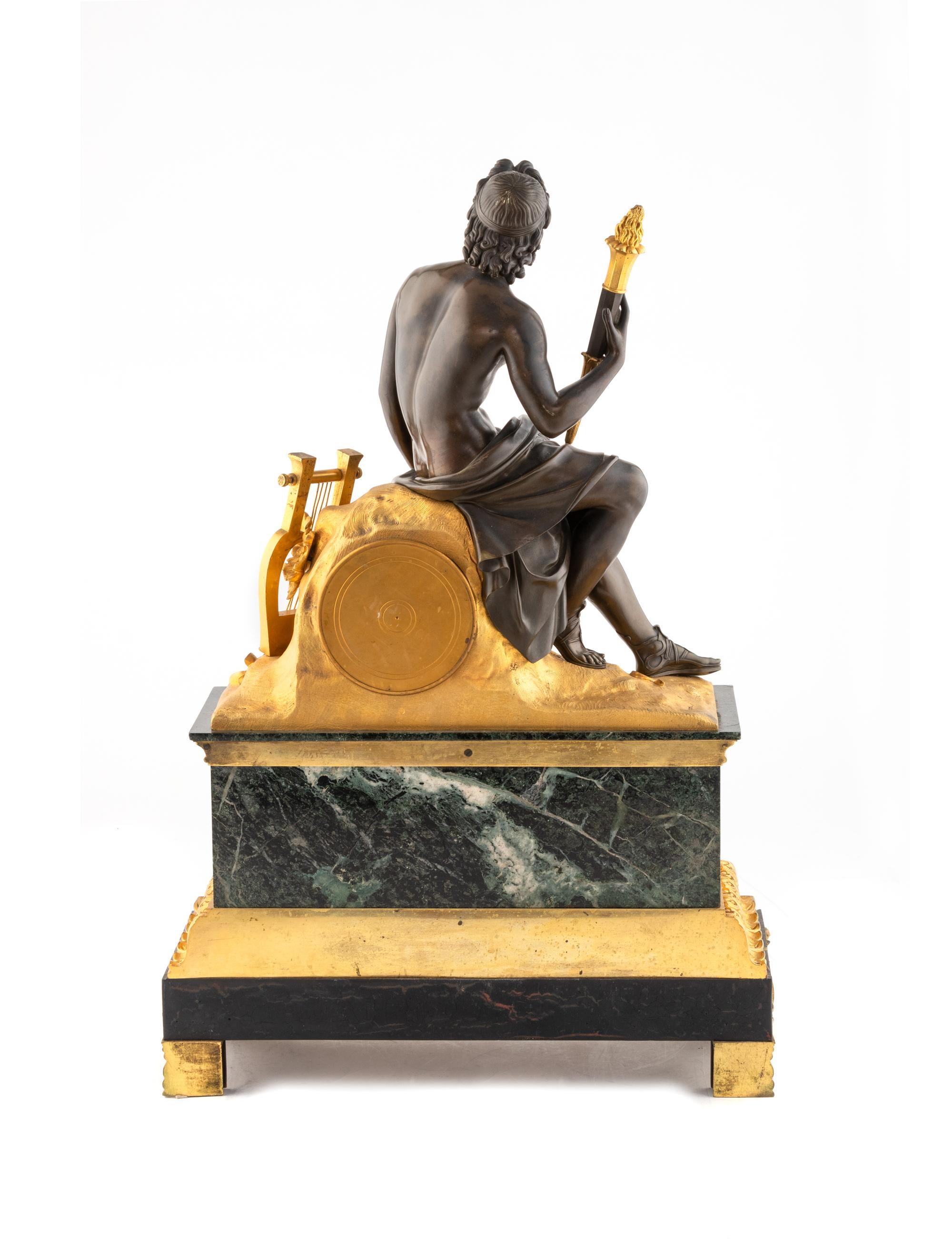 A Louis Philippe Gilt and Patinated Bronze and Marble Mantel Clock