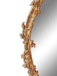 A Rococo Style Carved Giltwood Mirror