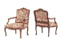 A Pair of Louis XV Walnut Fauteuils