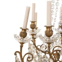 A French Gilt Bronze and Cut Glass Twelve-Light Chandelier
