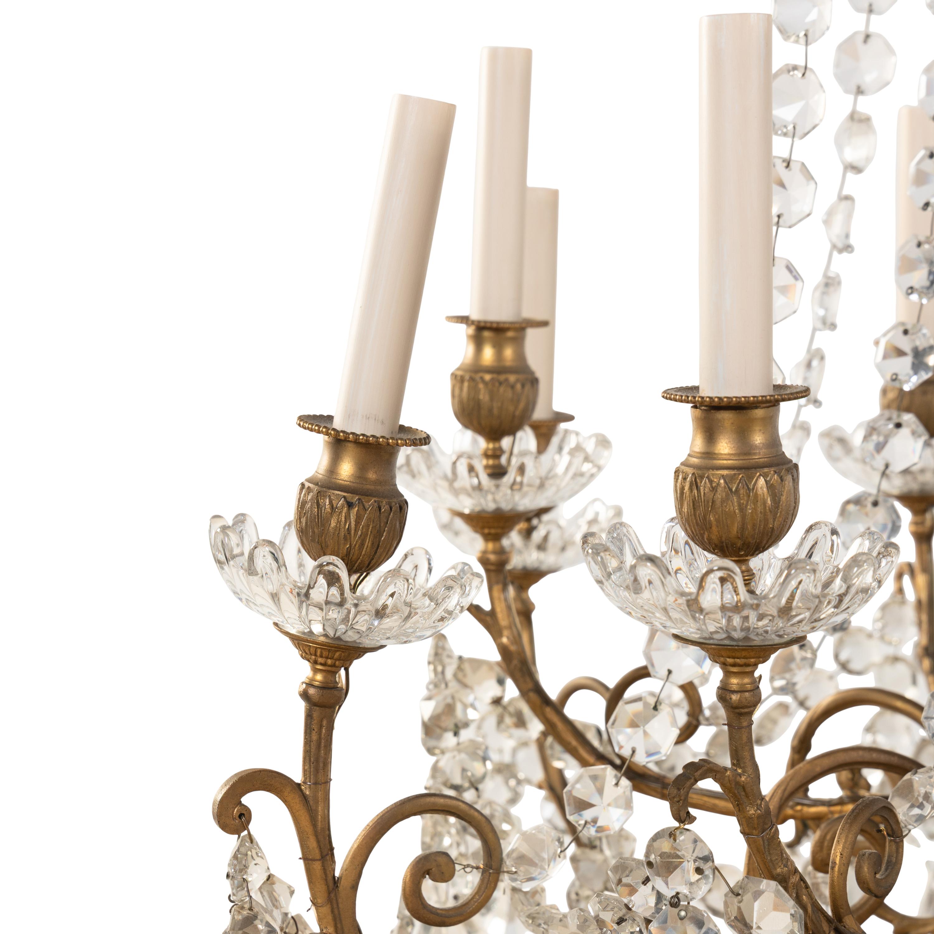 A French Gilt Bronze and Cut Glass Twelve-Light Chandelier
