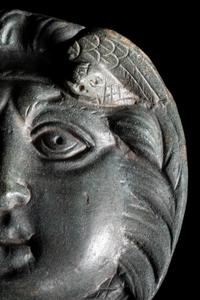 A Roman Bronze Roundel with Head of a Gorgon