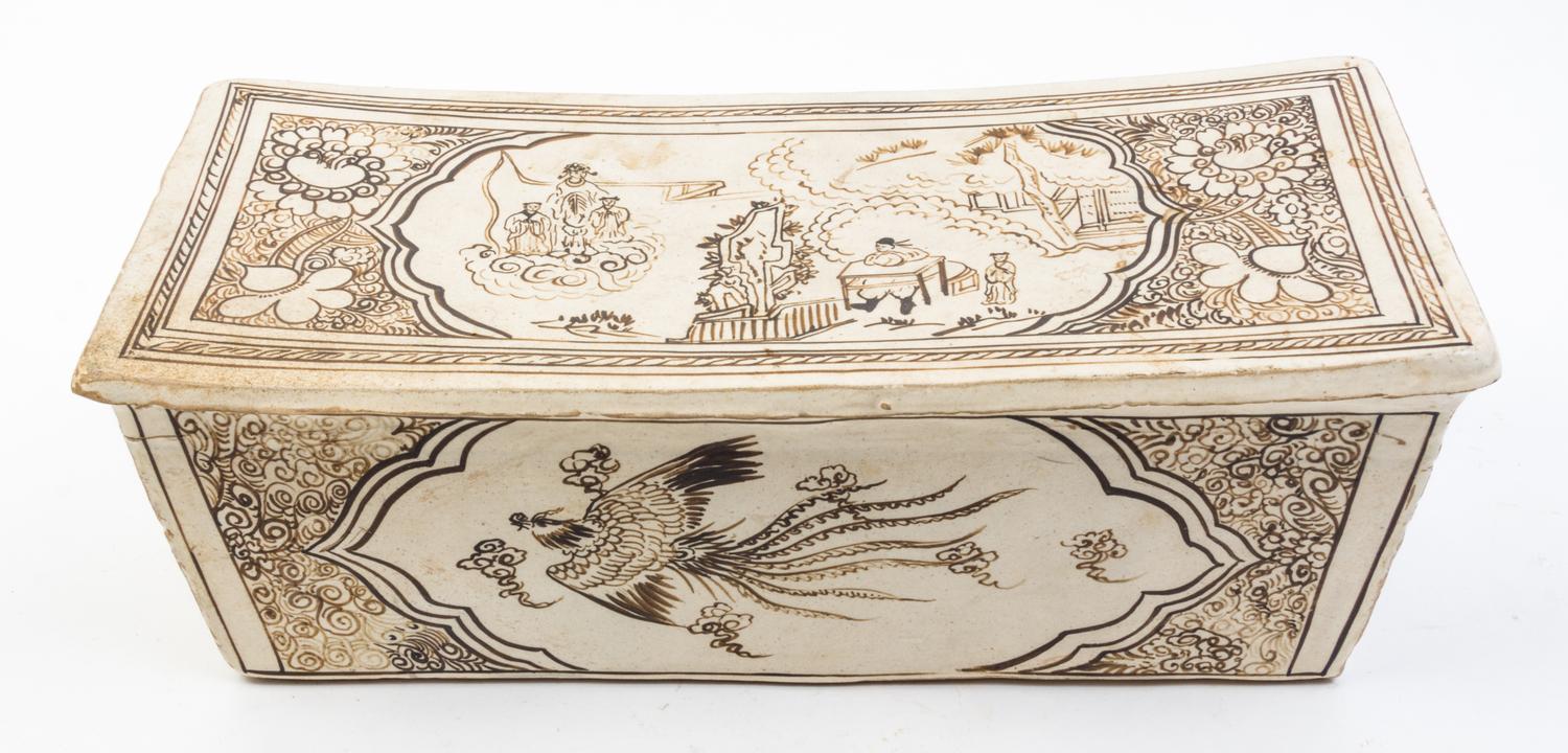 A Glazed Ceramic Pillow Width 15 5/8 inches.