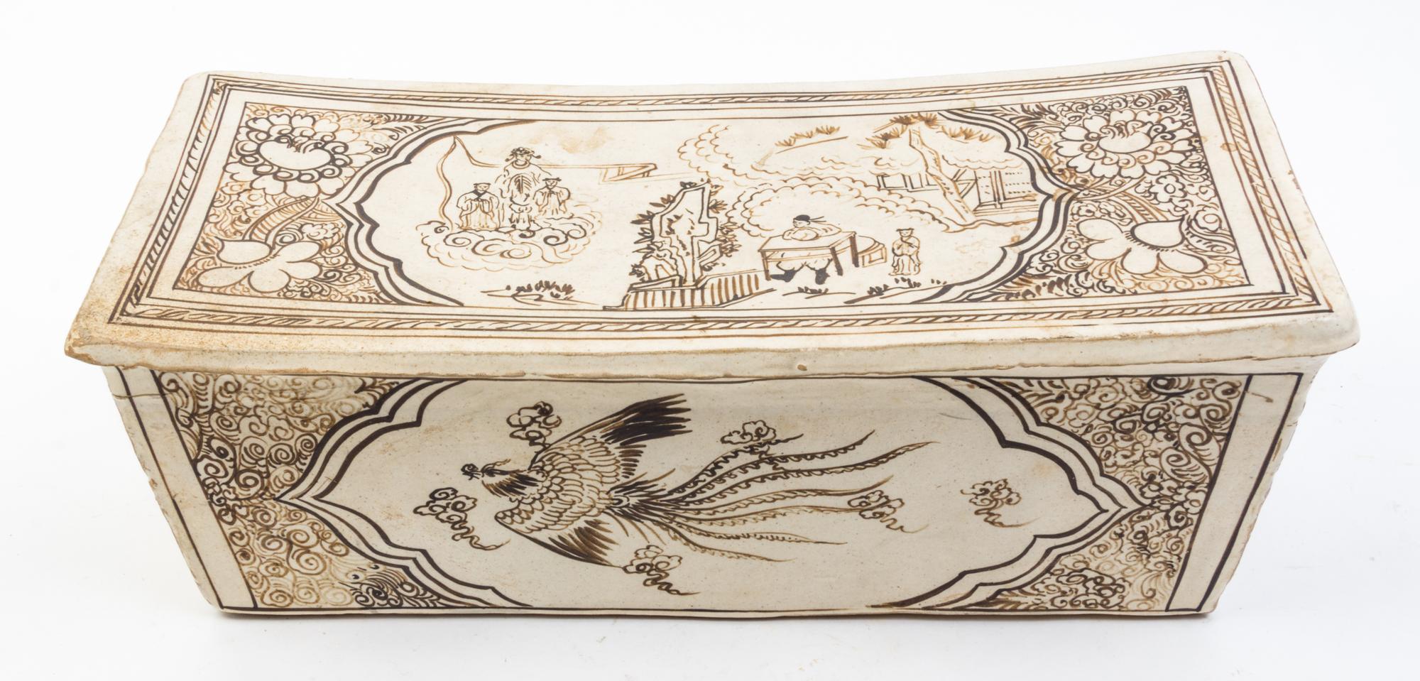 A Glazed Ceramic Pillow Width 15 5/8 inches.