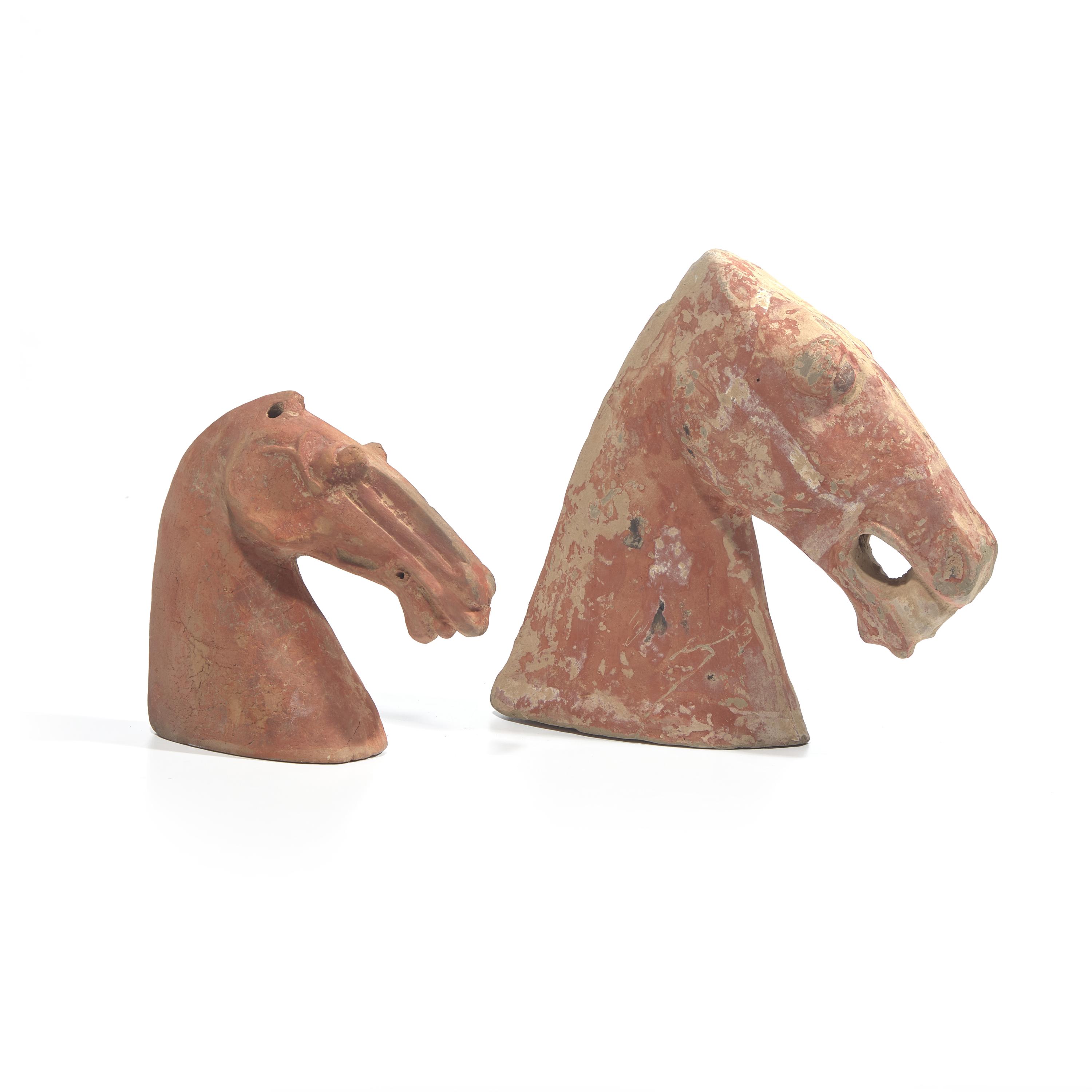 Two Chinese Painted Pottery Heads of Horses, Han Dynasty — 漢 紅陶馬頭兩件