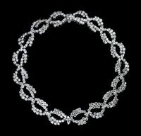 An Important Platinum and Diamond Necklace, 83.10 dwts.