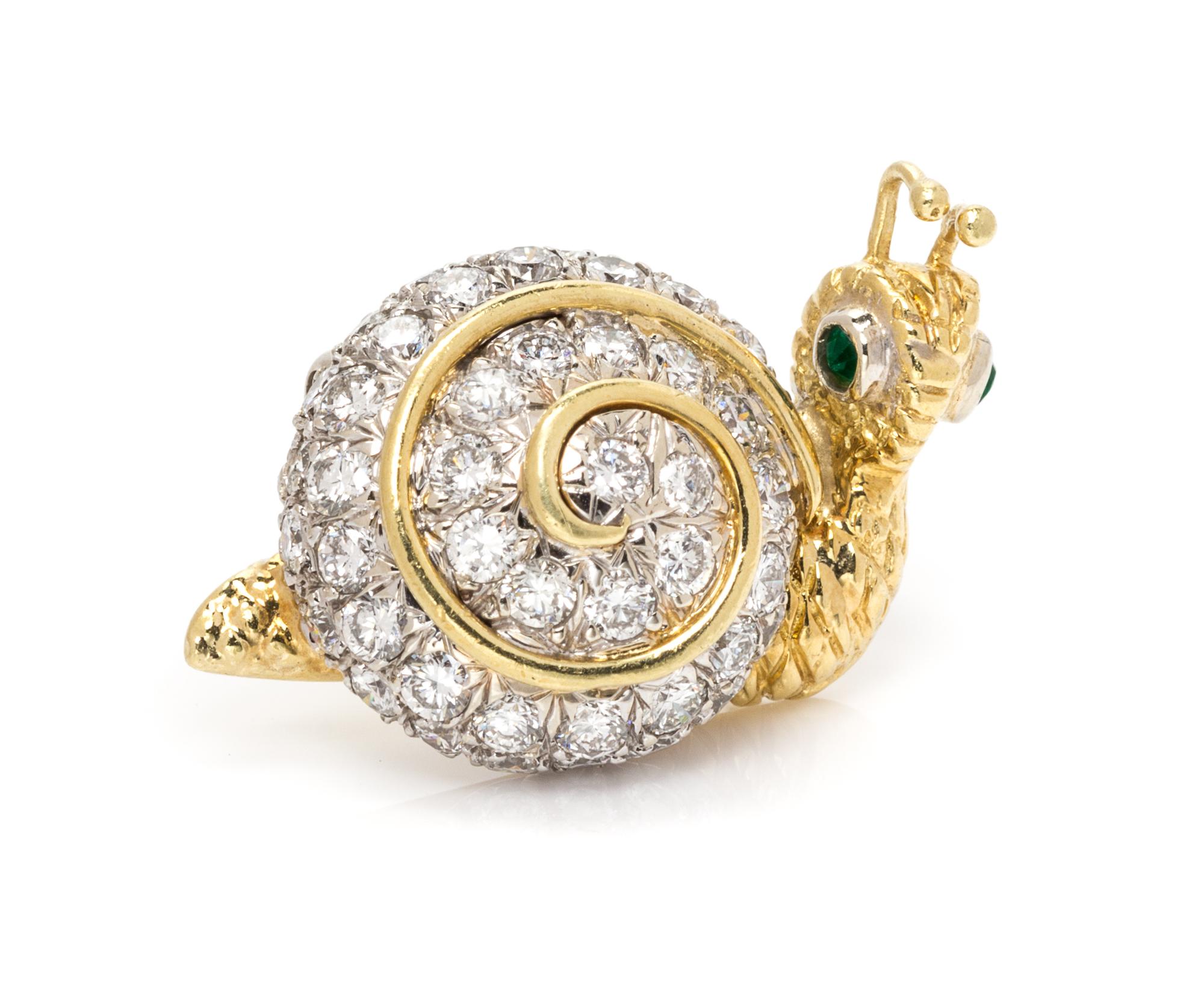 A Bicolor Gold, Diamond and Emerald Snail Brooch, 5.90 dwts.