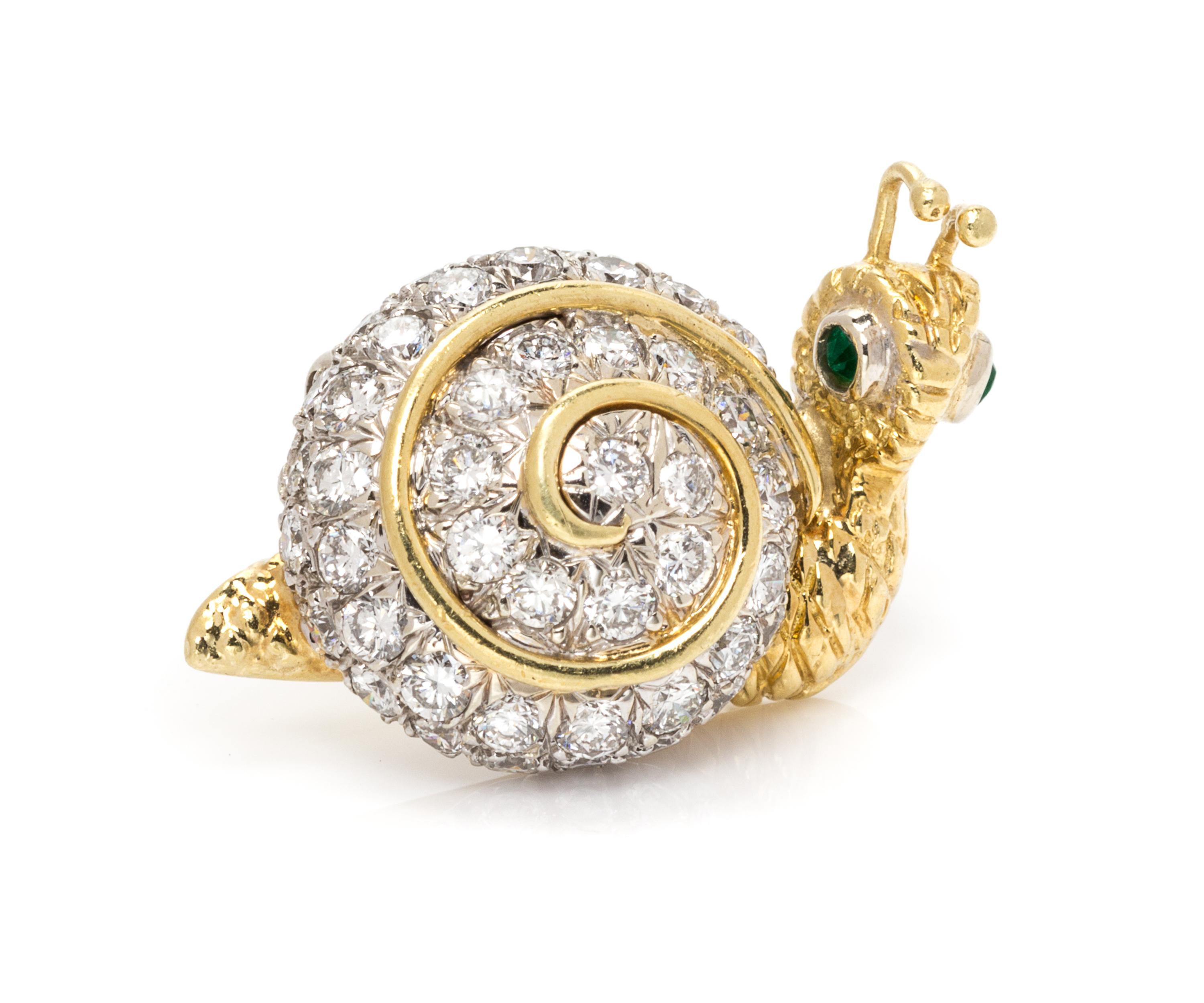 A Bicolor Gold, Diamond and Emerald Snail Brooch, 5.90 dwts.