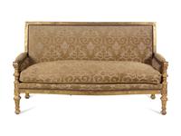 A Pair of Régence Style Carved Giltwood Sofas