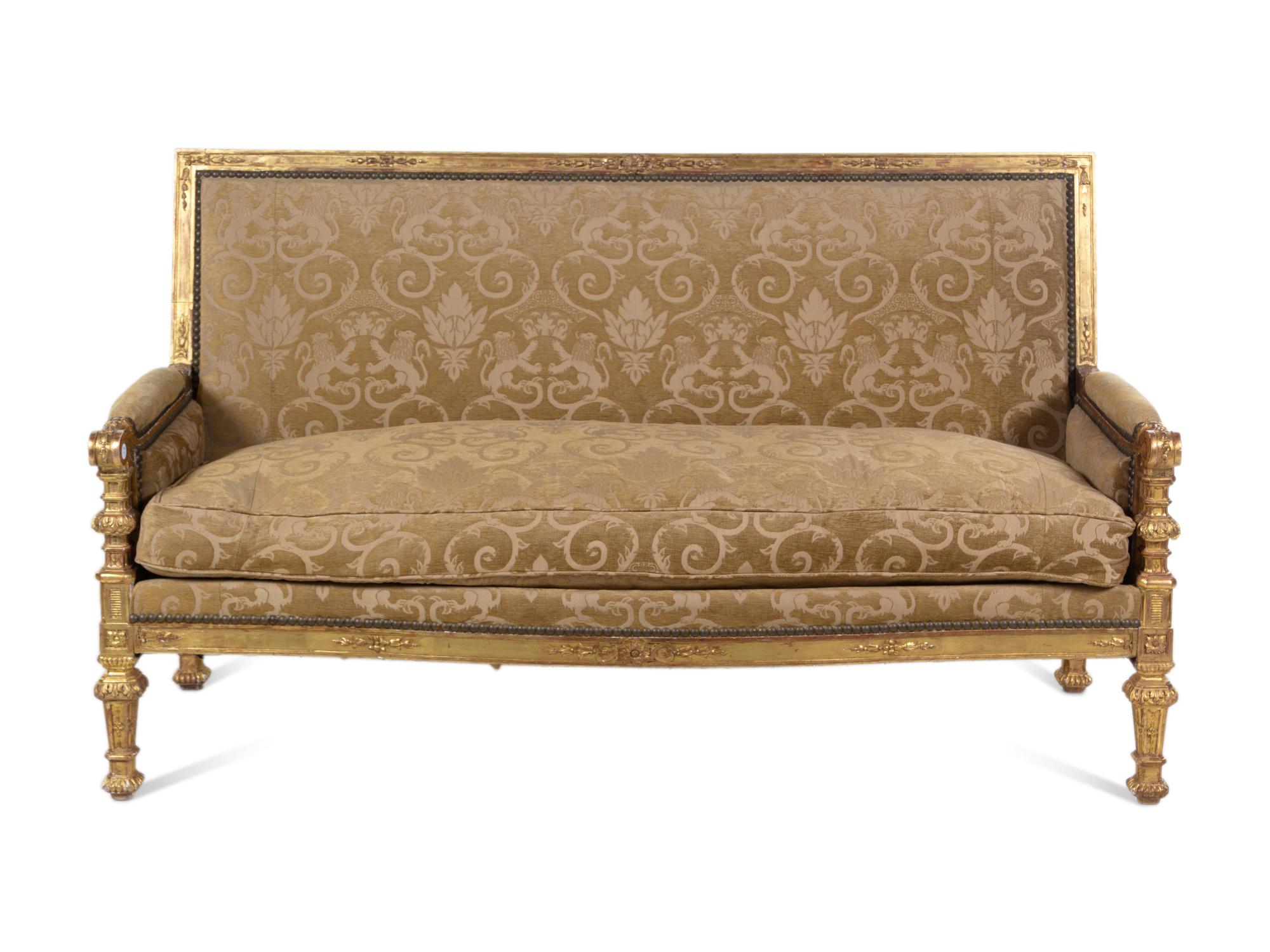 A Pair of Régence Style Carved Giltwood Sofas