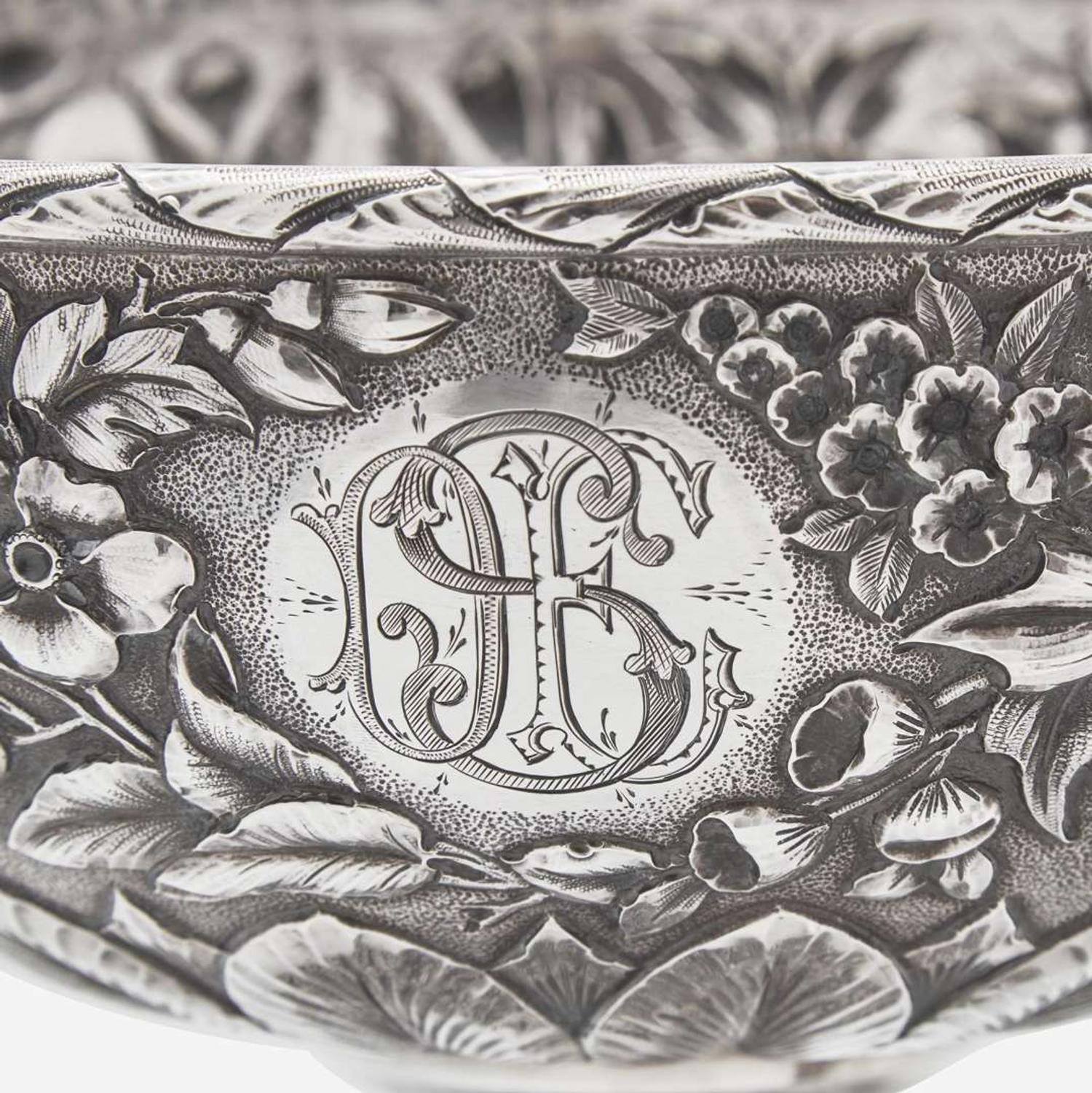 A sterling silver floral repoussé footed bowl and stand Peter L. Krider Co., Philadelphia, PA and Gorham Mfg. Co., Providence, RI, dated "1878," and 1897-1899, respectively