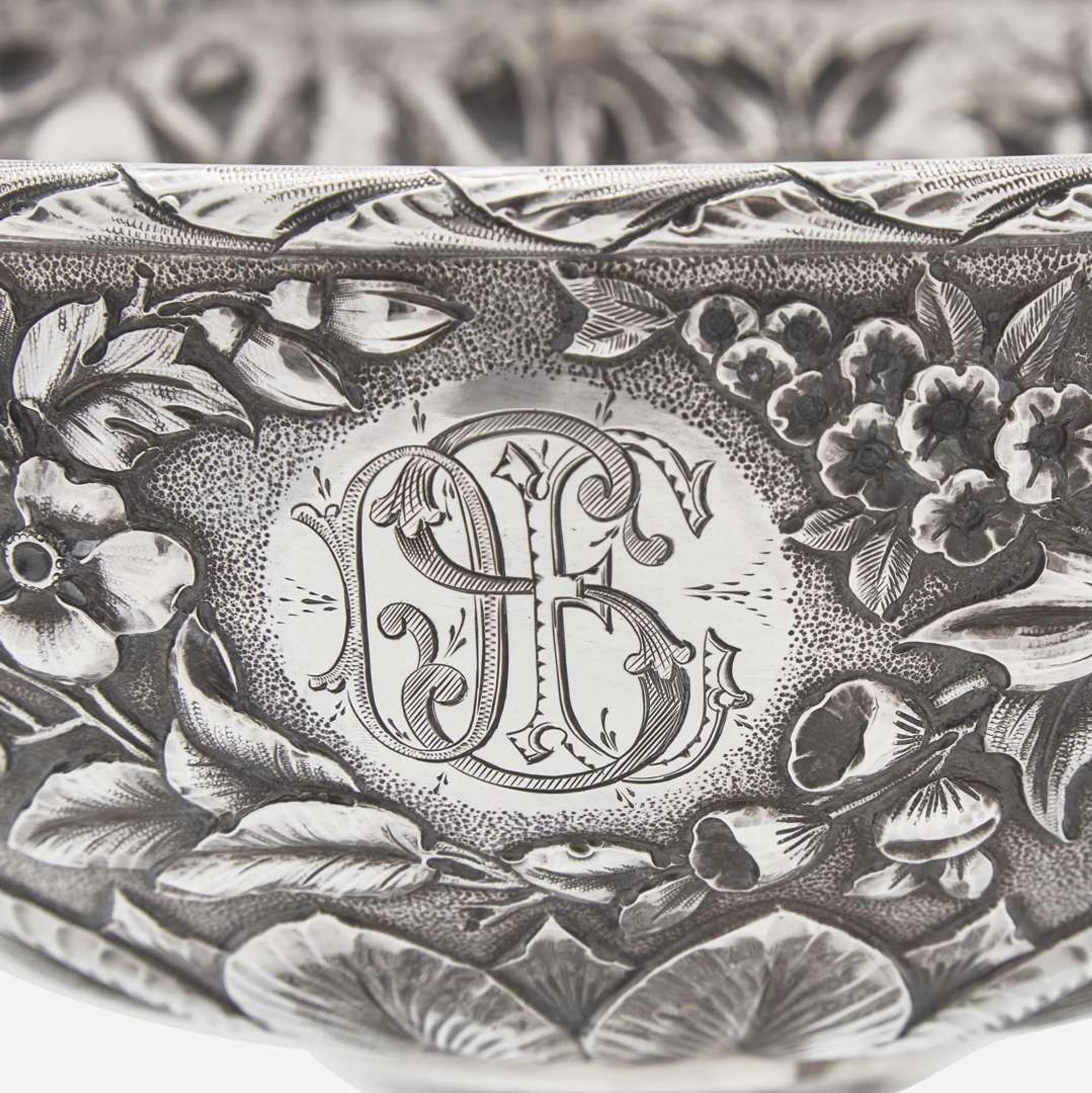 A sterling silver floral repoussé footed bowl and stand Peter L. Krider Co., Philadelphia, PA and Gorham Mfg. Co., Providence, RI, dated "1878," and 1897-1899, respectively