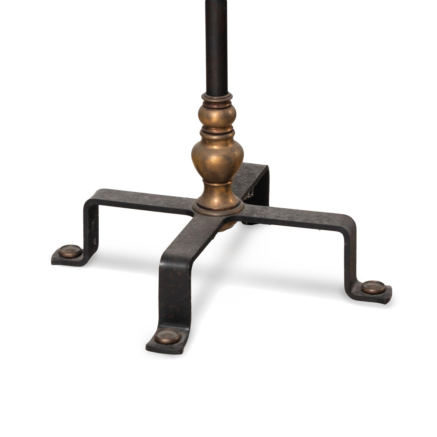 An Iron and Bronze Floor Lamp