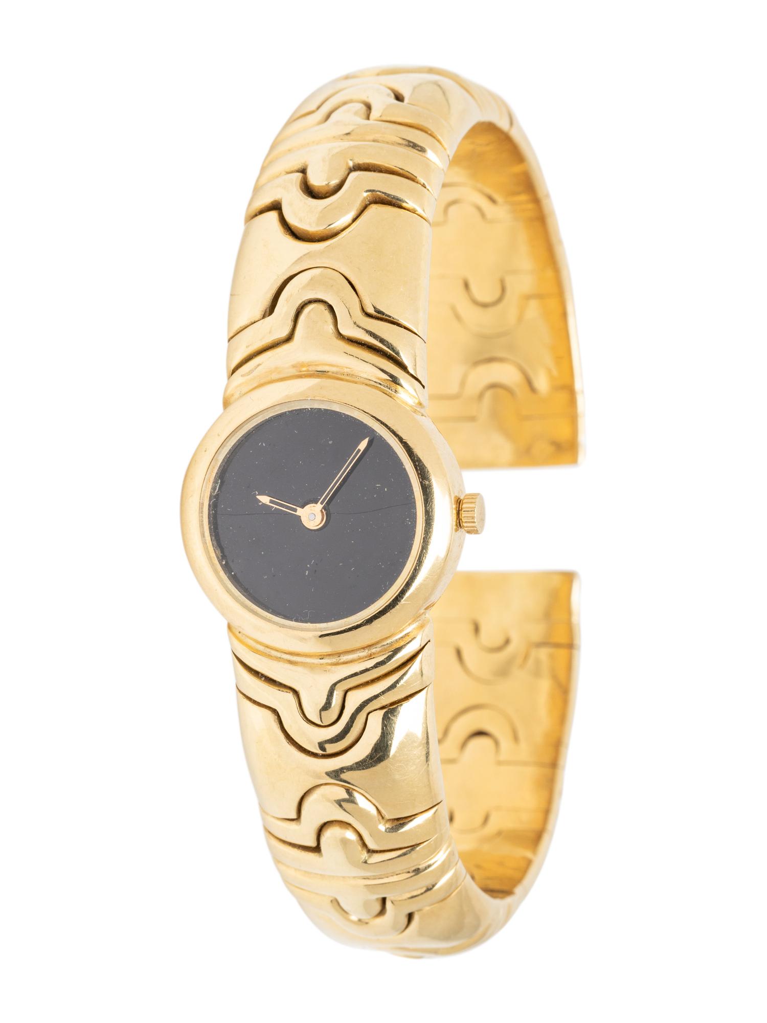 YELLOW GOLD BANGLE BRACELET WATCH