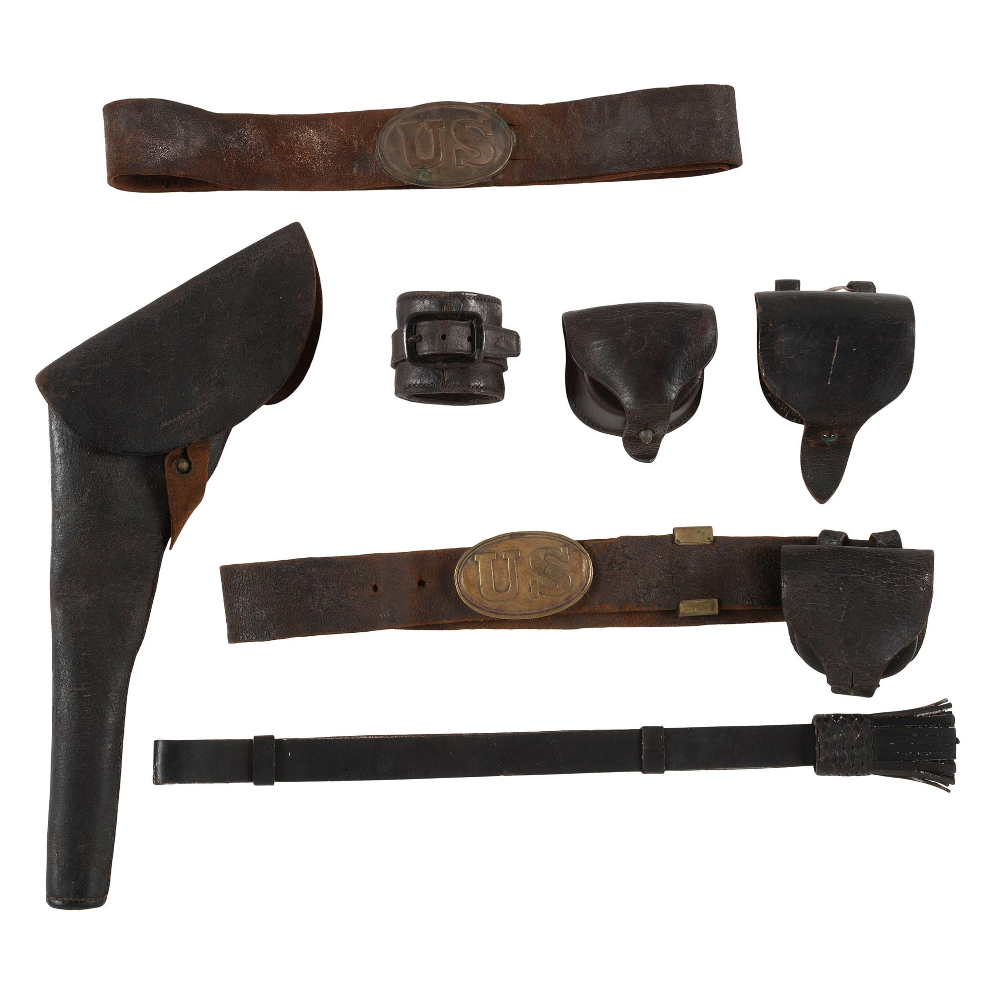 Group of Civil War Era Union Accoutrements: 2 Belts & U.S. Plates, 3 Cap Pouches, a Sword Knot, a Holster & A Carbine Thimble